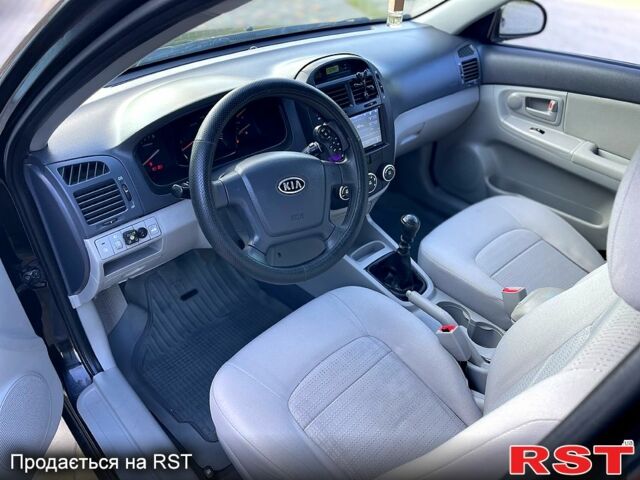 Черный Киа Черато, объемом двигателя 1.6 л и пробегом 190 тыс. км за 4350 $, фото 9 на Automoto.ua