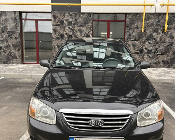 Черный Киа Черато, объемом двигателя 1.6 л и пробегом 206 тыс. км за 4500 $, фото 2 на Automoto.ua