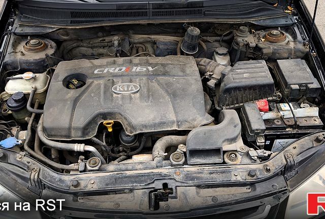 Черный Киа Черато, объемом двигателя 1.6 л и пробегом 204 тыс. км за 3700 $, фото 13 на Automoto.ua