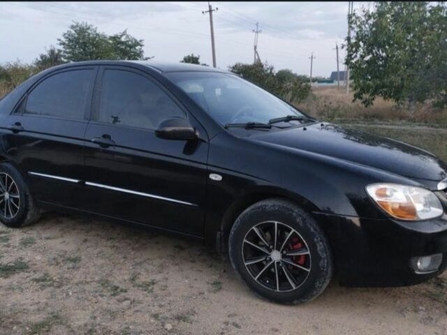 Черный Киа Черато, объемом двигателя 2 л и пробегом 290 тыс. км за 3600 $, фото 1 на Automoto.ua