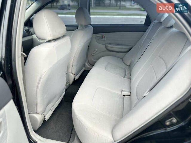 Чорний Кіа Черато, об'ємом двигуна 1.6 л та пробігом 272 тис. км за 5200 $, фото 14 на Automoto.ua