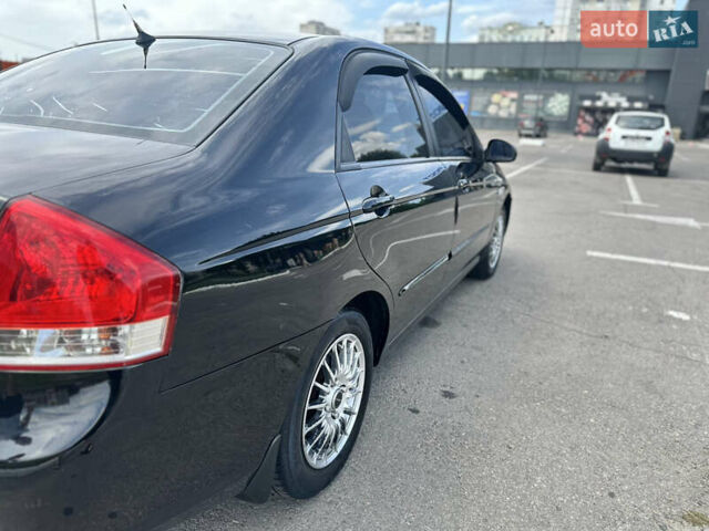 Чорний Кіа Черато, об'ємом двигуна 1.6 л та пробігом 272 тис. км за 5200 $, фото 6 на Automoto.ua