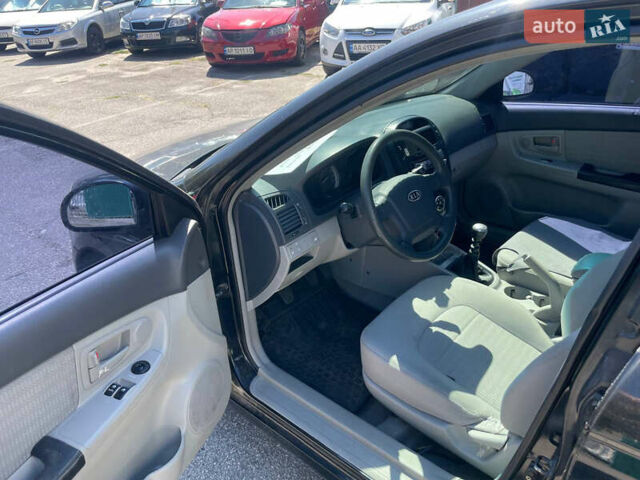 Черный Киа Черато, объемом двигателя 1.59 л и пробегом 210 тыс. км за 4100 $, фото 9 на Automoto.ua