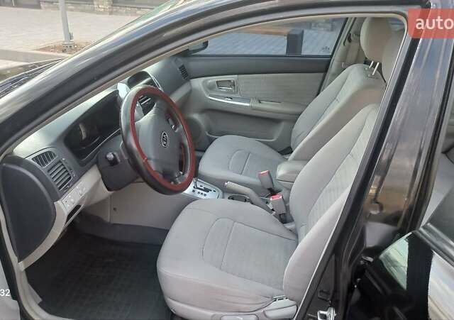 Черный Киа Черато, объемом двигателя 1.98 л и пробегом 268 тыс. км за 5200 $, фото 14 на Automoto.ua