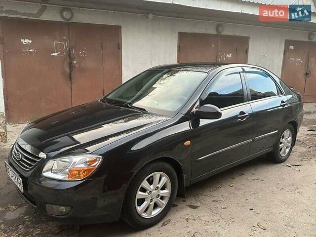 Черный Киа Черато, объемом двигателя 1.6 л и пробегом 230 тыс. км за 4950 $, фото 1 на Automoto.ua