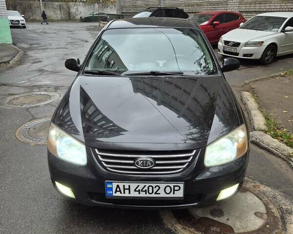 Черный Киа Черато, объемом двигателя 1.98 л и пробегом 180 тыс. км за 4500 $, фото 16 на Automoto.ua