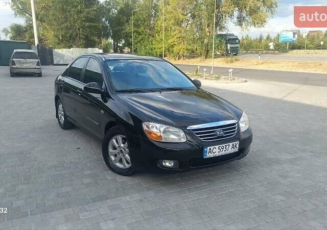 Черный Киа Черато, объемом двигателя 1.98 л и пробегом 268 тыс. км за 5200 $, фото 6 на Automoto.ua