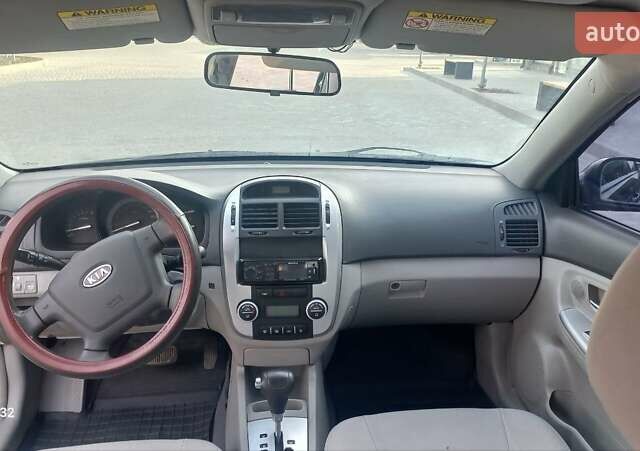 Черный Киа Черато, объемом двигателя 1.98 л и пробегом 268 тыс. км за 5200 $, фото 13 на Automoto.ua