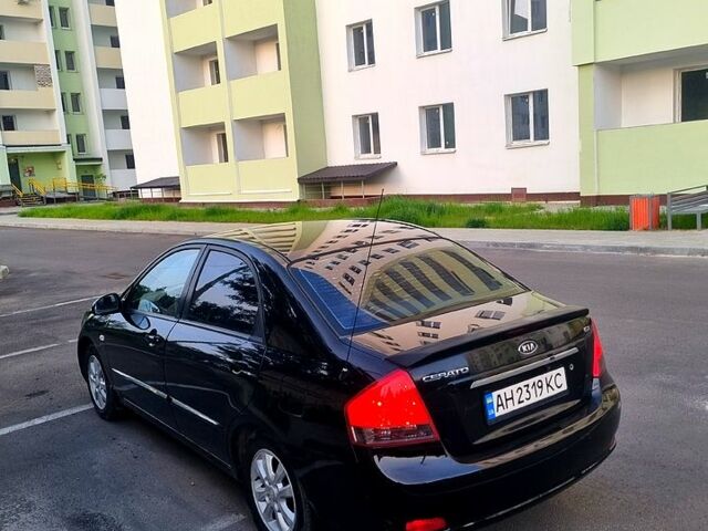 Черный Киа Черато, объемом двигателя 1.6 л и пробегом 200 тыс. км за 3999 $, фото 3 на Automoto.ua