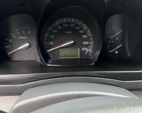 Черный Киа Черато, объемом двигателя 1.58 л и пробегом 355 тыс. км за 3500 $, фото 8 на Automoto.ua