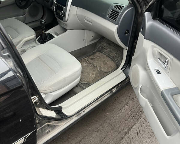 Черный Киа Черато, объемом двигателя 1.58 л и пробегом 355 тыс. км за 3500 $, фото 9 на Automoto.ua