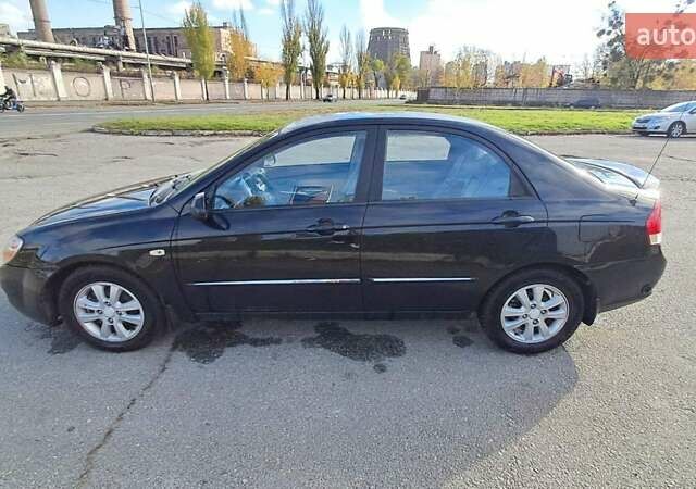 Черный Киа Черато, объемом двигателя 1.59 л и пробегом 349 тыс. км за 4000 $, фото 4 на Automoto.ua