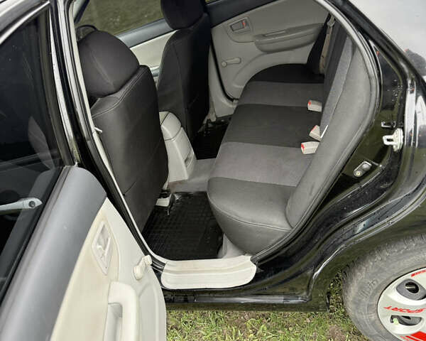 Черный Киа Черато, объемом двигателя 1.59 л и пробегом 312 тыс. км за 3000 $, фото 9 на Automoto.ua