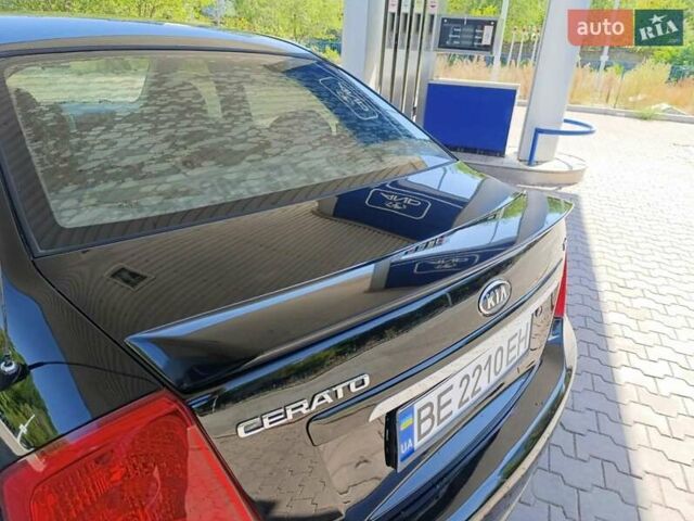 Чорний Кіа Черато, об'ємом двигуна 1.59 л та пробігом 219 тис. км за 4600 $, фото 24 на Automoto.ua