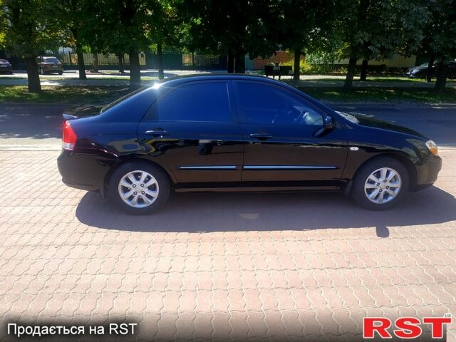 Чорний Кіа Черато, об'ємом двигуна 1.6 л та пробігом 179 тис. км за 5100 $, фото 3 на Automoto.ua