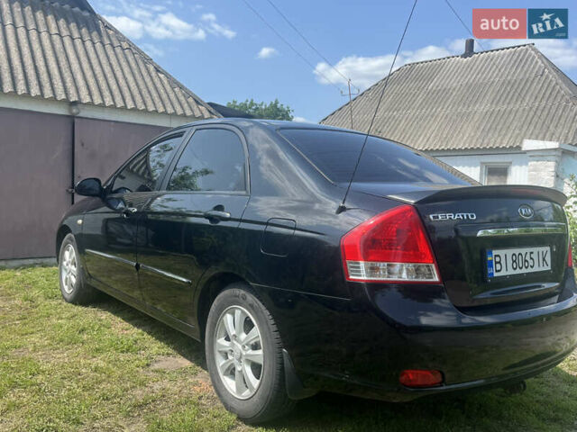 Черный Киа Черато, объемом двигателя 2 л и пробегом 223 тыс. км за 4700 $, фото 3 на Automoto.ua