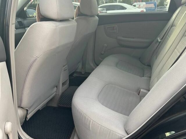 Черный Киа Черато, объемом двигателя 1.6 л и пробегом 292 тыс. км за 4000 $, фото 5 на Automoto.ua