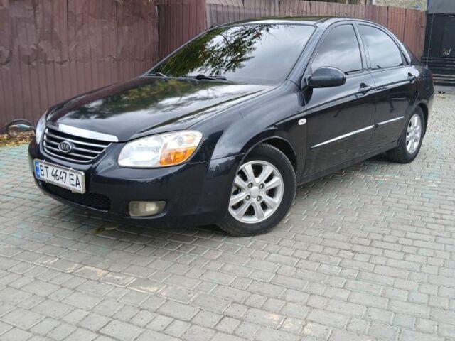 Черный Киа Черато, объемом двигателя 2 л и пробегом 250 тыс. км за 3700 $, фото 6 на Automoto.ua