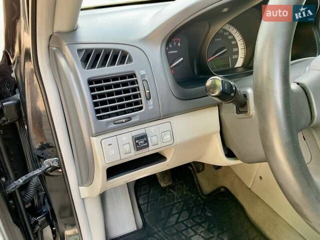 Чорний Кіа Черато, об'ємом двигуна 1.98 л та пробігом 155 тис. км за 5100 $, фото 5 на Automoto.ua