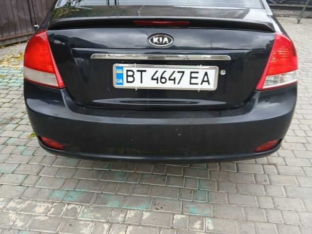 Черный Киа Черато, объемом двигателя 2 л и пробегом 250 тыс. км за 3700 $, фото 3 на Automoto.ua