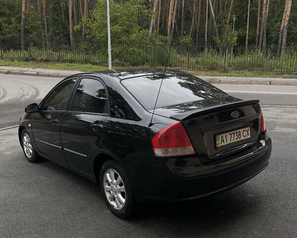 Черный Киа Черато, объемом двигателя 1.59 л и пробегом 273 тыс. км за 2999 $, фото 2 на Automoto.ua