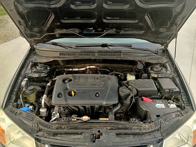 Черный Киа Черато, объемом двигателя 1.6 л и пробегом 210 тыс. км за 4000 $, фото 8 на Automoto.ua