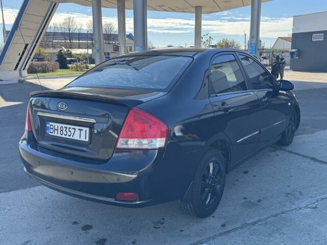 Чорний Кіа Черато, об'ємом двигуна 2 л та пробігом 362 тис. км за 3900 $, фото 4 на Automoto.ua
