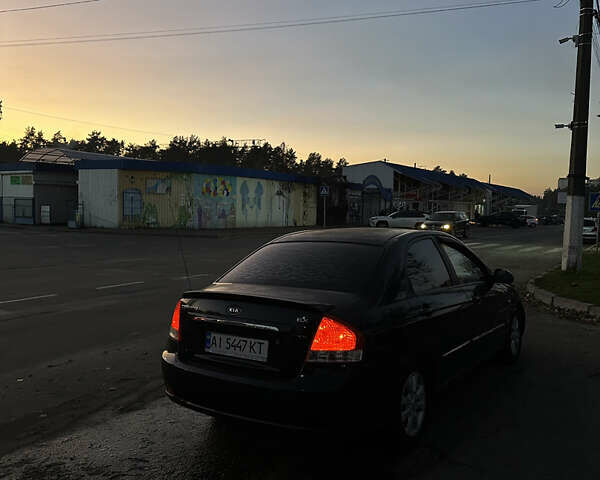 Черный Киа Черато, объемом двигателя 1.6 л и пробегом 294 тыс. км за 3500 $, фото 3 на Automoto.ua