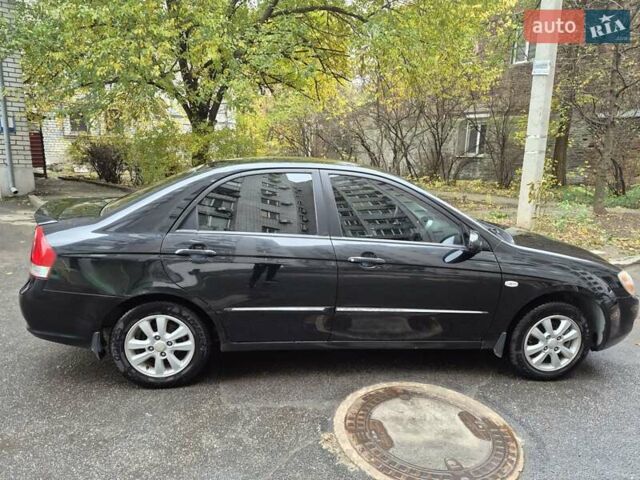 Черный Киа Черато, объемом двигателя 1.98 л и пробегом 180 тыс. км за 4500 $, фото 4 на Automoto.ua