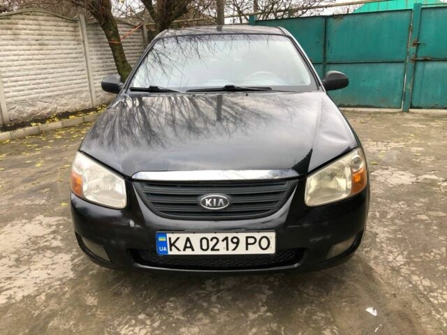 Черный Киа Черато, объемом двигателя 1.6 л и пробегом 240 тыс. км за 3300 $, фото 1 на Automoto.ua