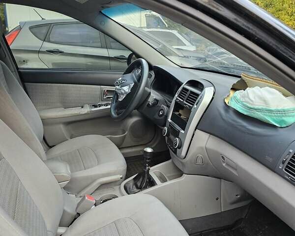 Киа Черато 2007 в Киеве на Automoto.ua Черный Киа Черато, объемом двигателя 1.59 л и пробегом 200 тыс. км за 1150 $, фото 1 на Automoto.ua
