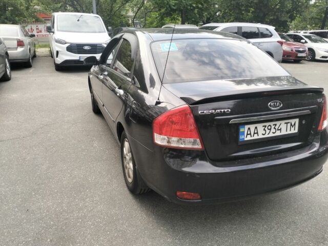 Чорний Кіа Черато, об'ємом двигуна 2 л та пробігом 246 тис. км за 4200 $, фото 4 на Automoto.ua