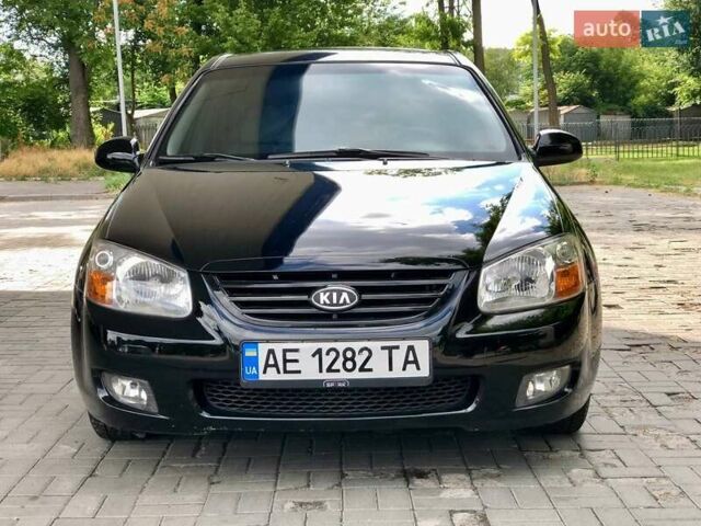 Чорний Кіа Черато, об'ємом двигуна 1.98 л та пробігом 155 тис. км за 5100 $, фото 1 на Automoto.ua