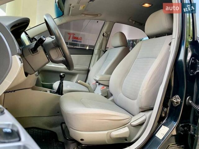 Чорний Кіа Черато, об'ємом двигуна 1.98 л та пробігом 155 тис. км за 5100 $, фото 12 на Automoto.ua