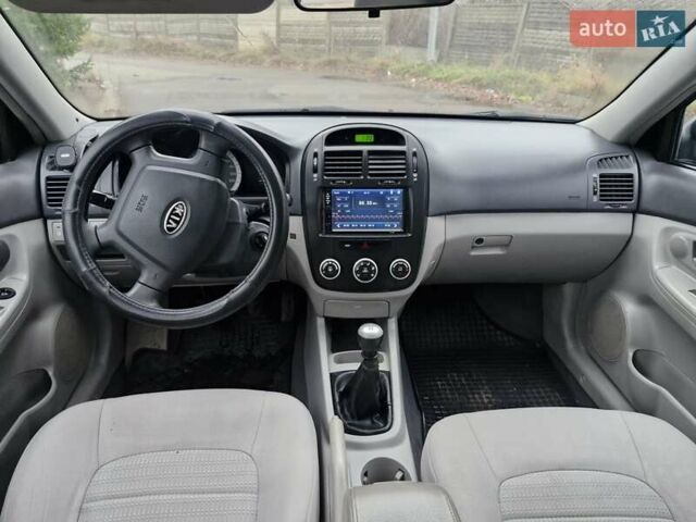 Черный Киа Черато, объемом двигателя 1.6 л и пробегом 280 тыс. км за 4300 $, фото 7 на Automoto.ua