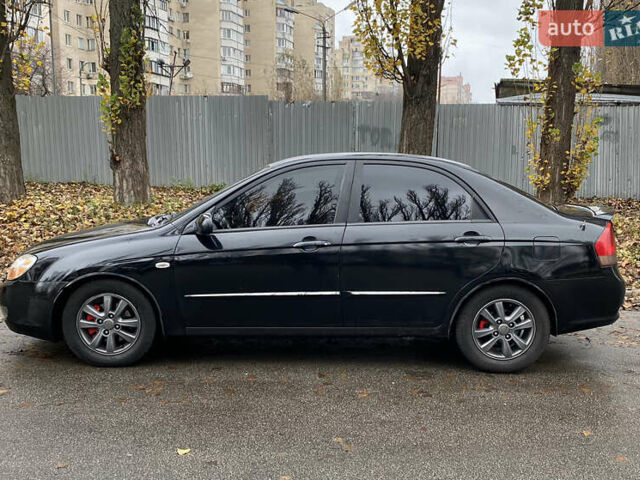 Черный Киа Черато, объемом двигателя 1.98 л и пробегом 306 тыс. км за 3800 $, фото 3 на Automoto.ua