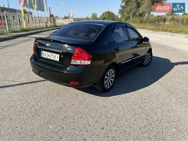 Чорний Кіа Черато, об'ємом двигуна 1.98 л та пробігом 163 тис. км за 5500 $, фото 2 на Automoto.ua