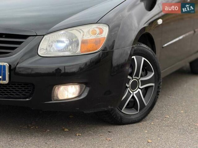 Чорний Кіа Черато, об'ємом двигуна 1.6 л та пробігом 224 тис. км за 4900 $, фото 4 на Automoto.ua