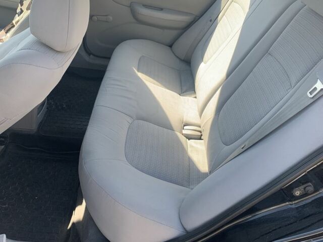 Черный Киа Черато, объемом двигателя 1.6 л и пробегом 172 тыс. км за 3400 $, фото 6 на Automoto.ua