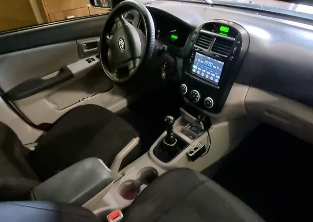 Черный Киа Черато, объемом двигателя 1 л и пробегом 193 тыс. км за 4600 $, фото 7 на Automoto.ua