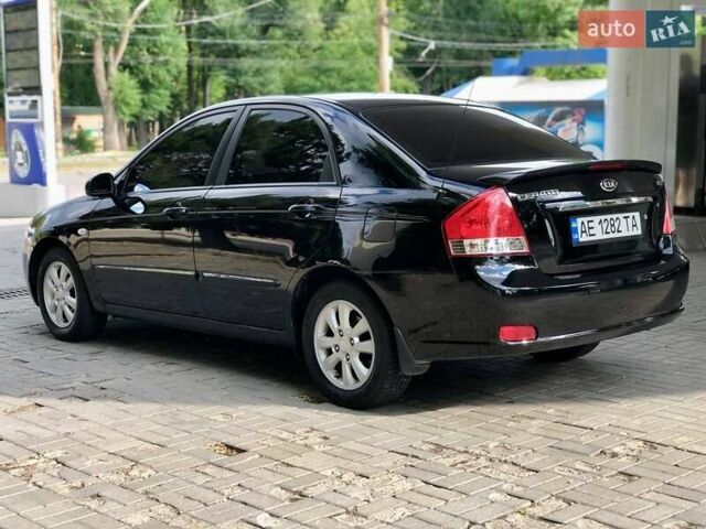 Чорний Кіа Черато, об'ємом двигуна 1.98 л та пробігом 155 тис. км за 5100 $, фото 2 на Automoto.ua