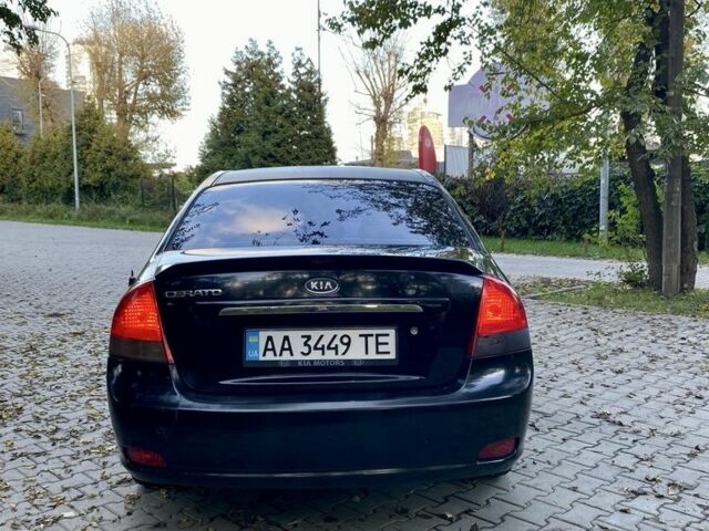 Черный Киа Черато, объемом двигателя 2 л и пробегом 302 тыс. км за 4600 $, фото 2 на Automoto.ua
