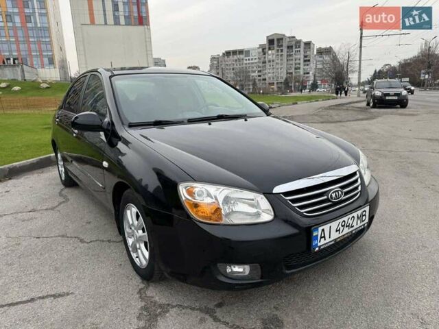 Черный Киа Черато, объемом двигателя 1.6 л и пробегом 232 тыс. км за 3850 $, фото 5 на Automoto.ua