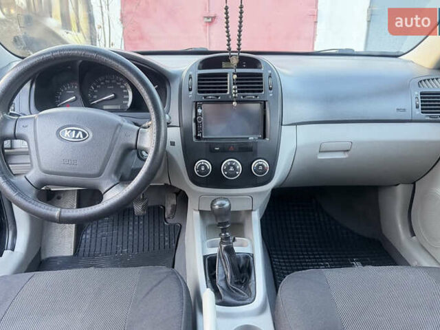 Чорний Кіа Черато, об'ємом двигуна 1.59 л та пробігом 250 тис. км за 4300 $, фото 4 на Automoto.ua