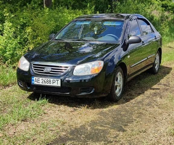 Черный Киа Черато, объемом двигателя 1.6 л и пробегом 278 тыс. км за 4350 $, фото 1 на Automoto.ua