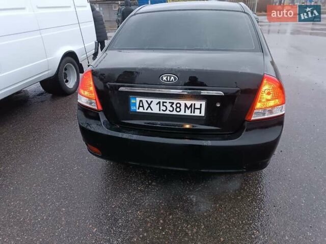 Черный Киа Черато, объемом двигателя 1.6 л и пробегом 260 тыс. км за 5200 $, фото 2 на Automoto.ua