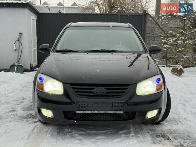 Черный Киа Черато, объемом двигателя 1.98 л и пробегом 183 тыс. км за 5999 $, фото 2 на Automoto.ua