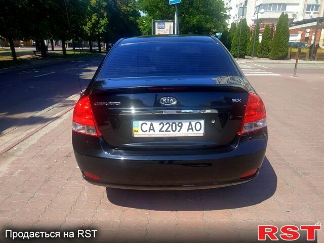 Чорний Кіа Черато, об'ємом двигуна 1.6 л та пробігом 179 тис. км за 5100 $, фото 2 на Automoto.ua