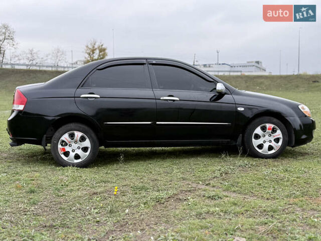 Черный Киа Черато, объемом двигателя 1.59 л и пробегом 312 тыс. км за 3000 $, фото 5 на Automoto.ua