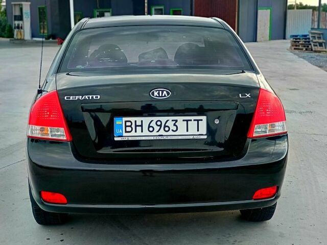 Черный Киа Черато, объемом двигателя 1.6 л и пробегом 210 тыс. км за 4000 $, фото 4 на Automoto.ua